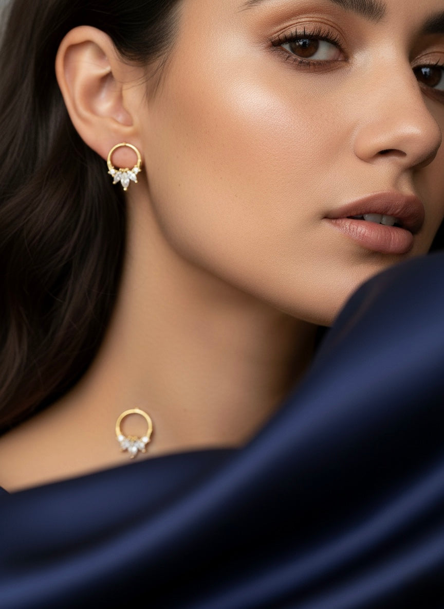Elegant gold stud earrings with stone