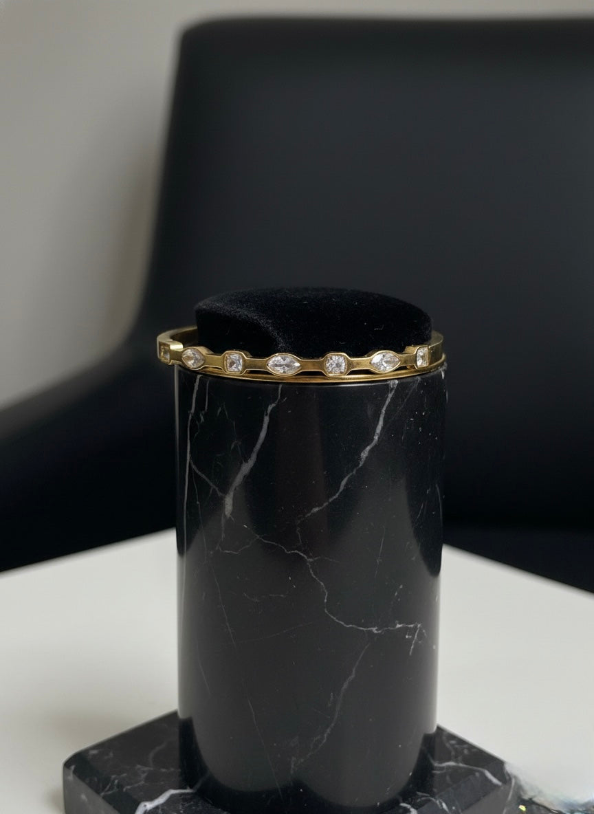 Minimal gold bangle, subtle sparkle