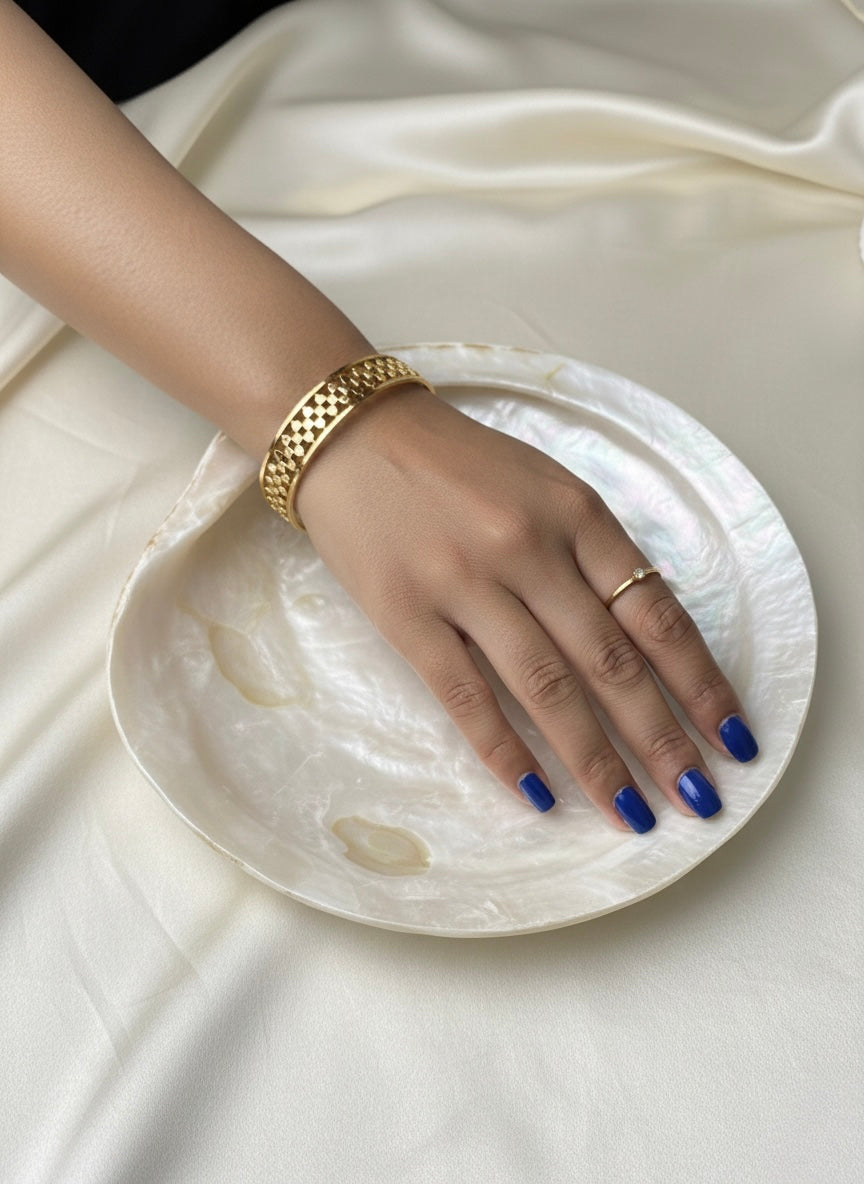 Textured gold bracelet for elegance