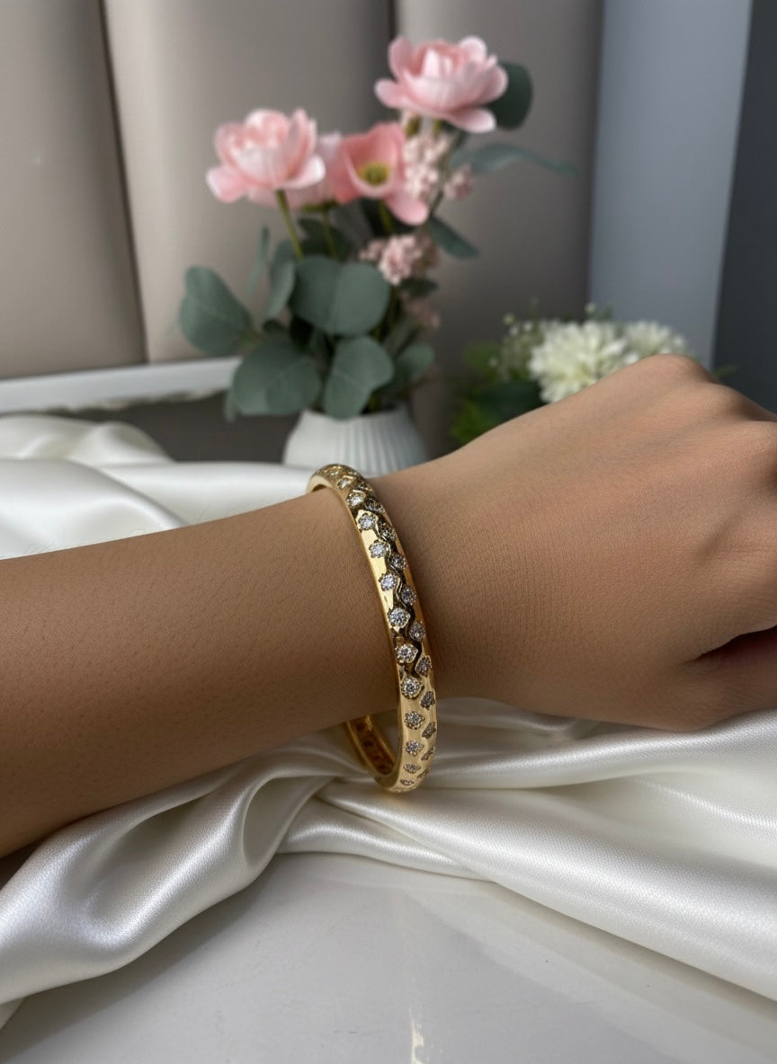 Timeless diamond-look gold bangle