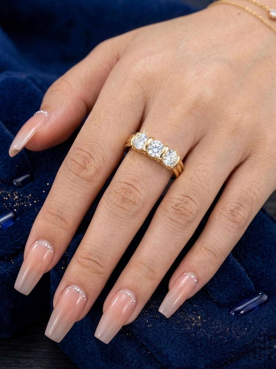Elegant three diamond gold ring