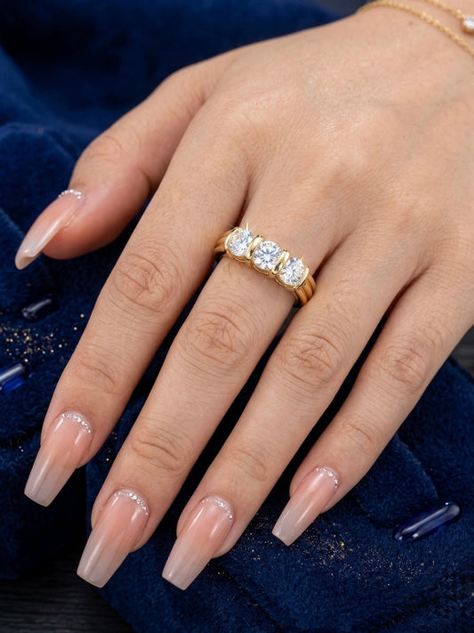 Elegant three diamond gold ring
