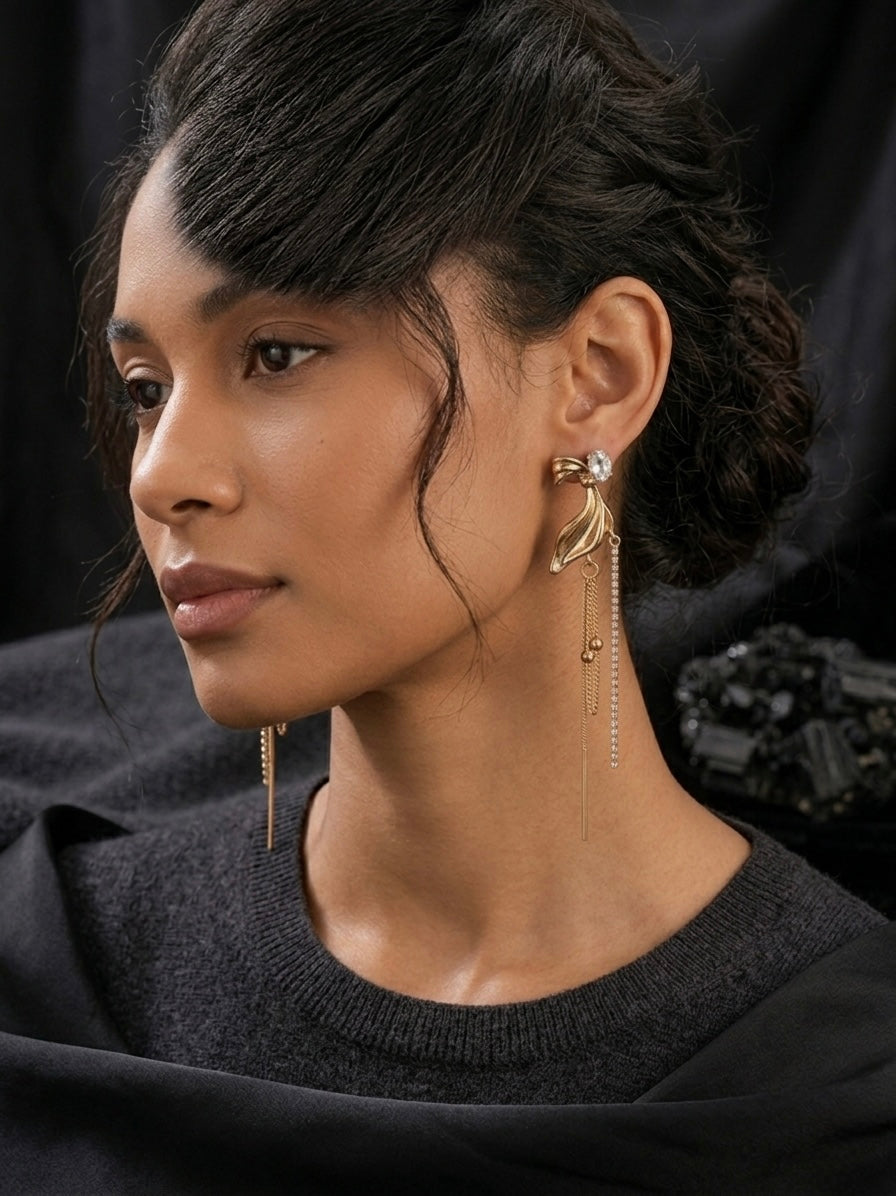 Sophisticated gold leaf crystal drop earrings.
