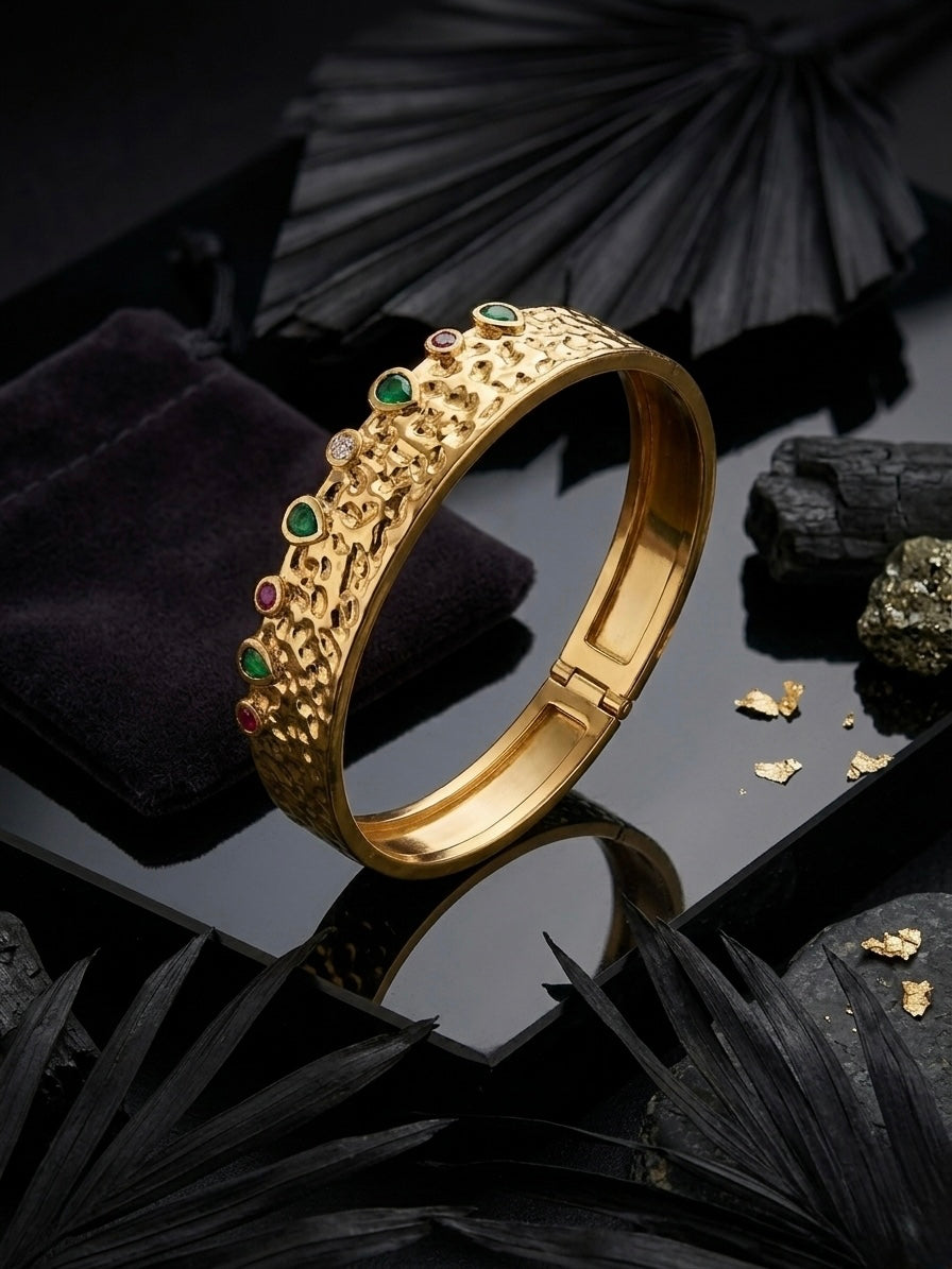Artisan textured gold colorful gemstone cuff.