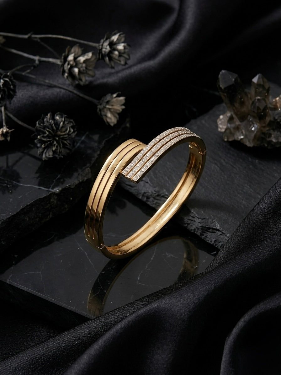 Elegant split-band pave diamond gold bracelet.