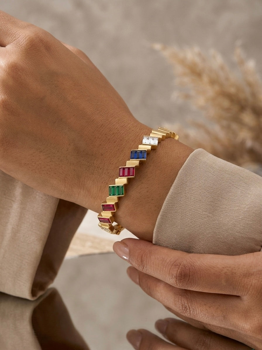 Gold multi-gemstone baguette staircase bracelet.