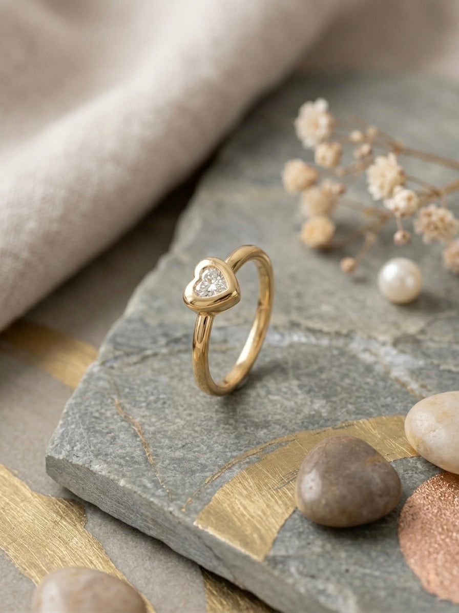 Elegant gold heart diamond ring.