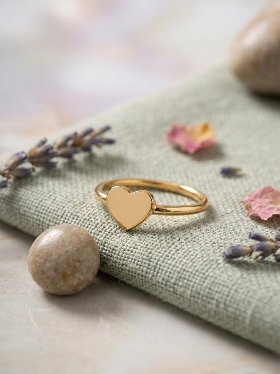 Simple and elegant gold heart ring.
