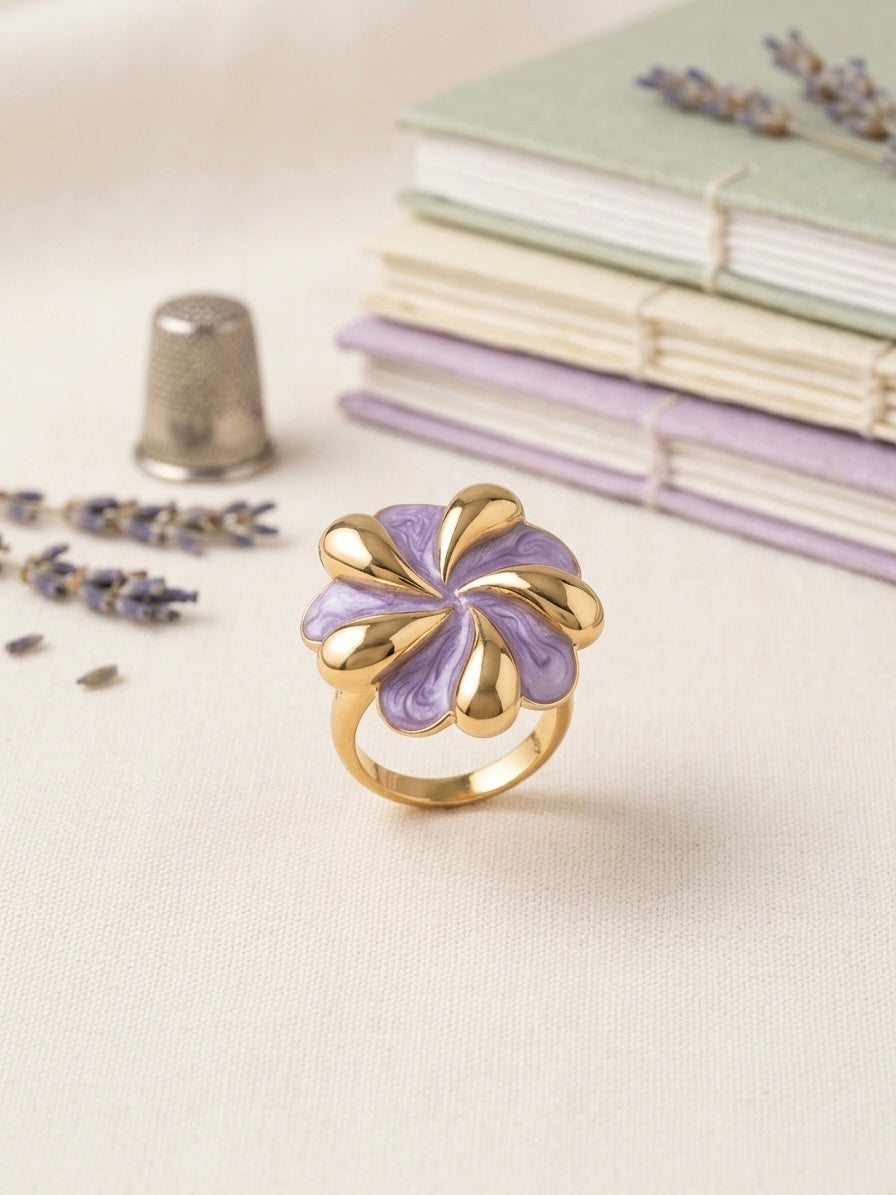 Elegant gold and lavender enamel ring.