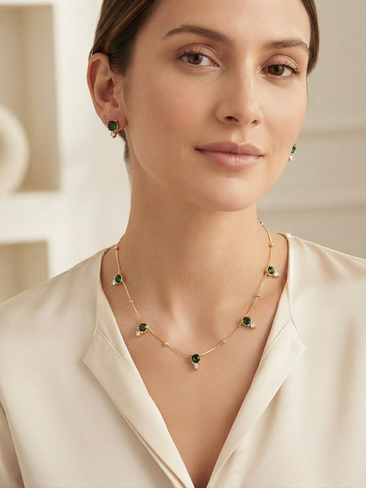 Delicate emerald stone necklace set.