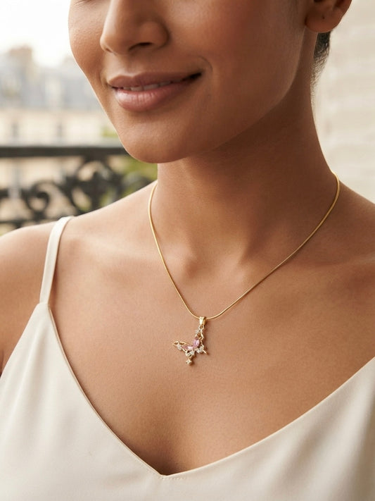 Delicate gold butterfly crystal necklace.