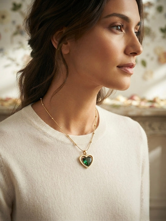 Stunning green heart, radiant gold necklace.