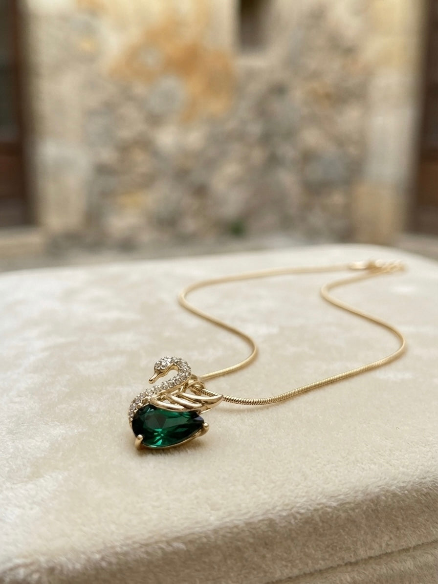 Sparkling swan design, durable luxury accessory.