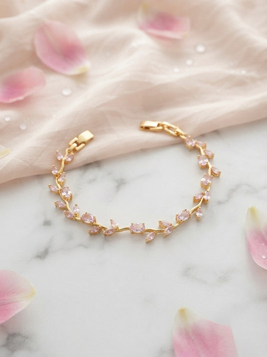 Radiant floral bracelet, timeless gold.