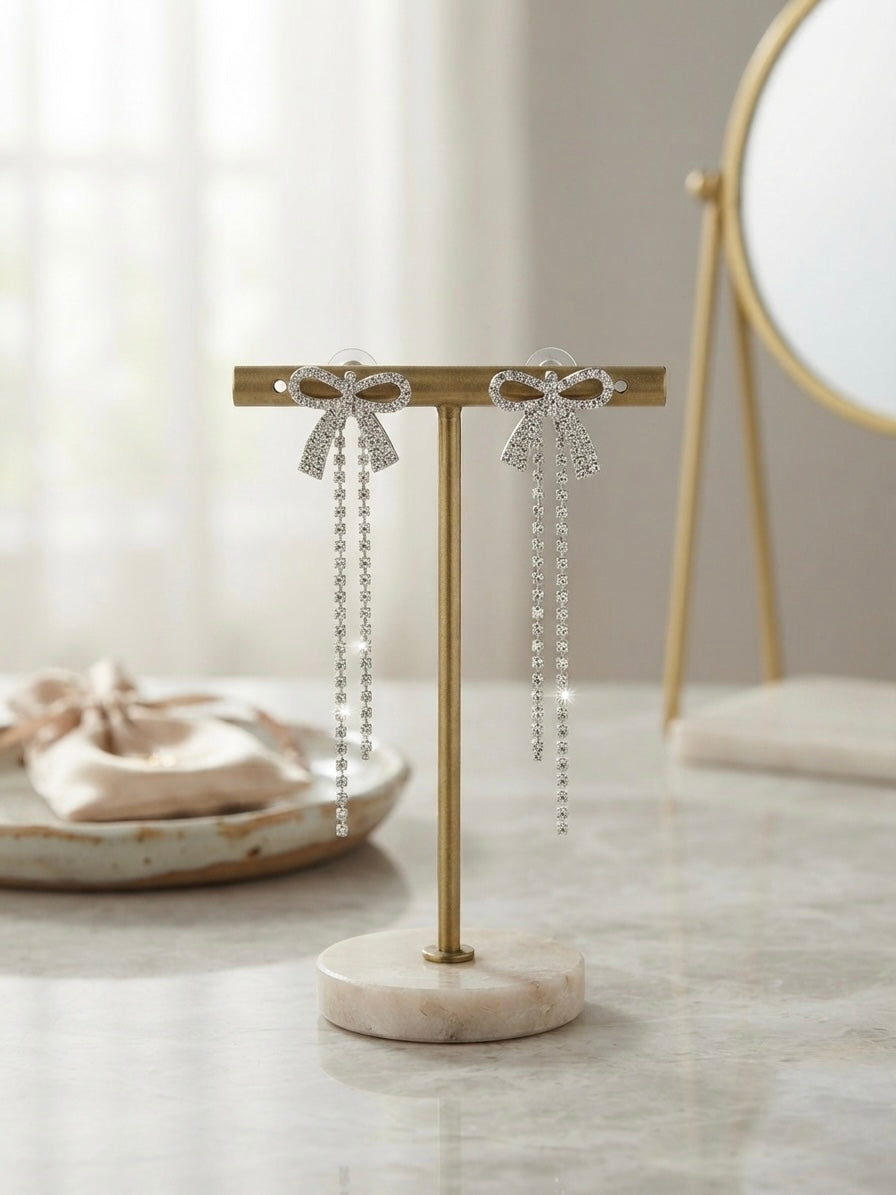 Elegant crystal bow drop statement earrings.