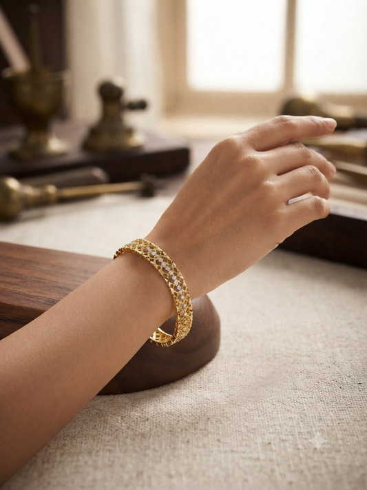 Elegant lattice gold diamond-studded bracelet.
