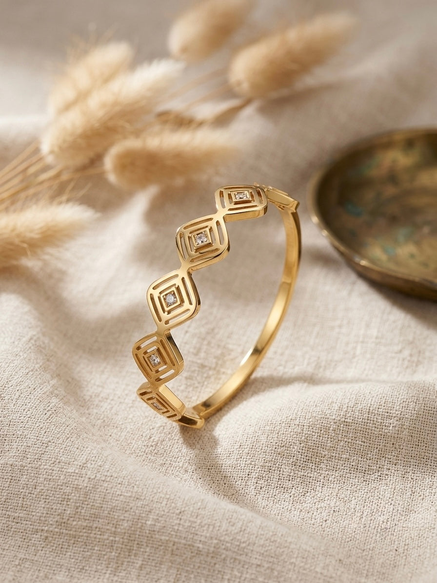 Sophisticated geometric stone gold bracelet.