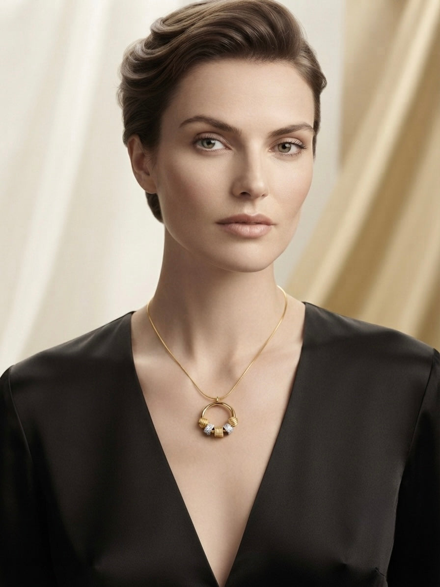 Modern gold charm ring pendant necklace.