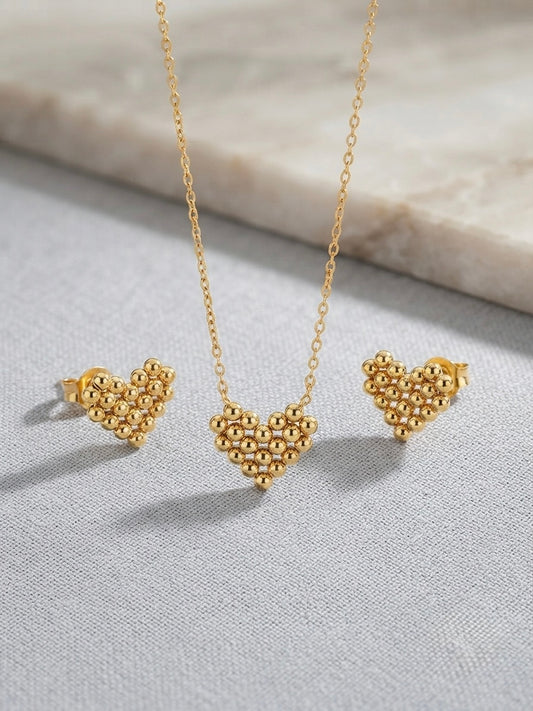 Textured gold beaded heart necklace and studs.