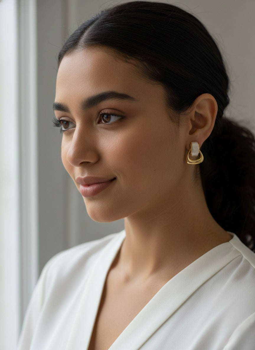 Vintage gold and triangle pearl earrings.