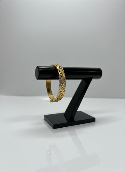 Luxury gold bangle with detailing