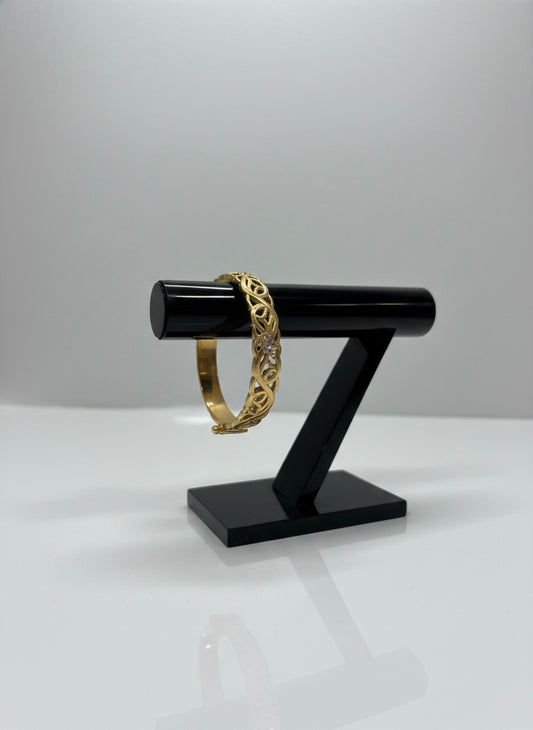 Luxury gold bangle with detailing