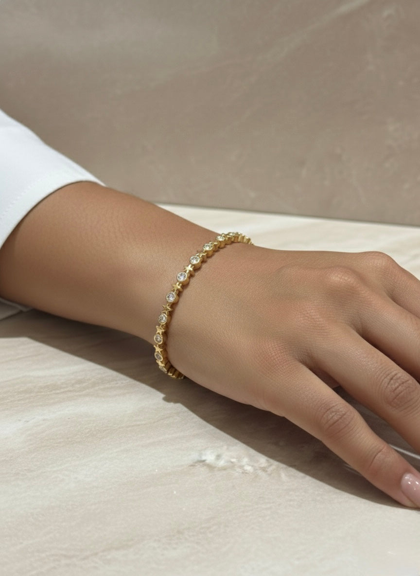 Chic gold bracelet with stones