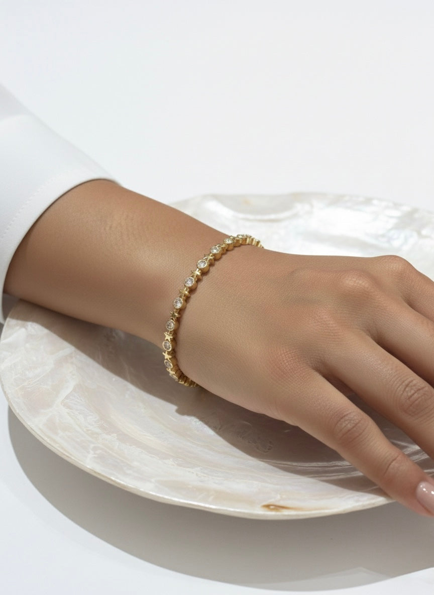 Chic gold bracelet with stones