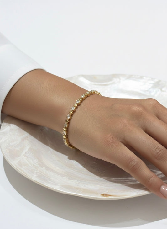 Chic gold bracelet with stones