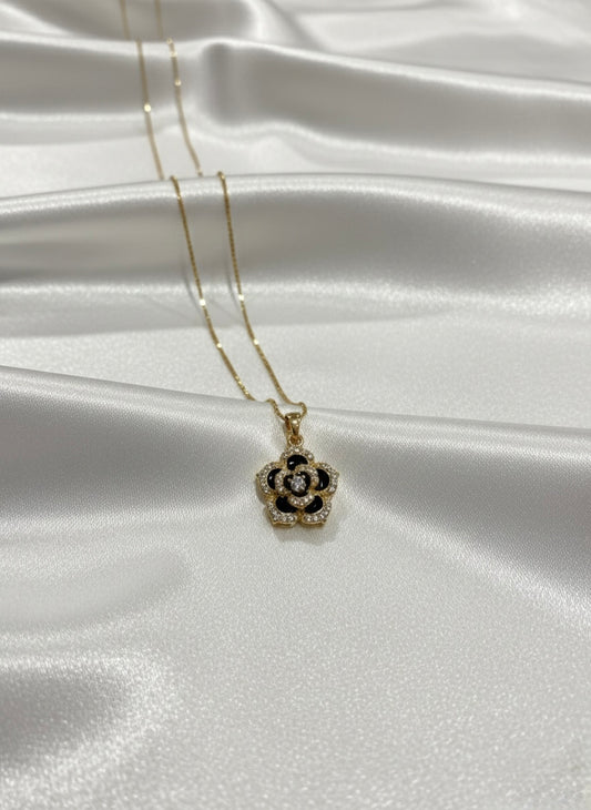 Floral black enamel diamond pendant