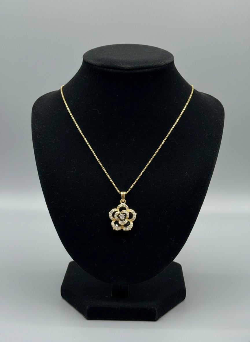 Floral black enamel diamond pendant