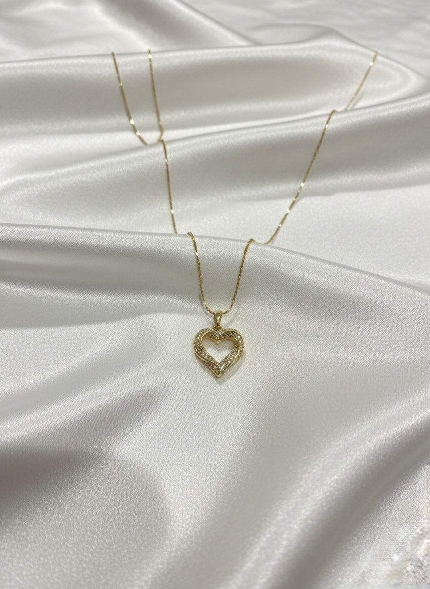 Delicate diamond heart pendant