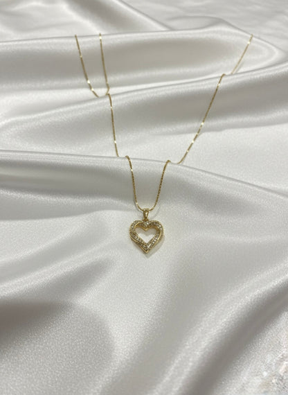 Delicate diamond heart pendant