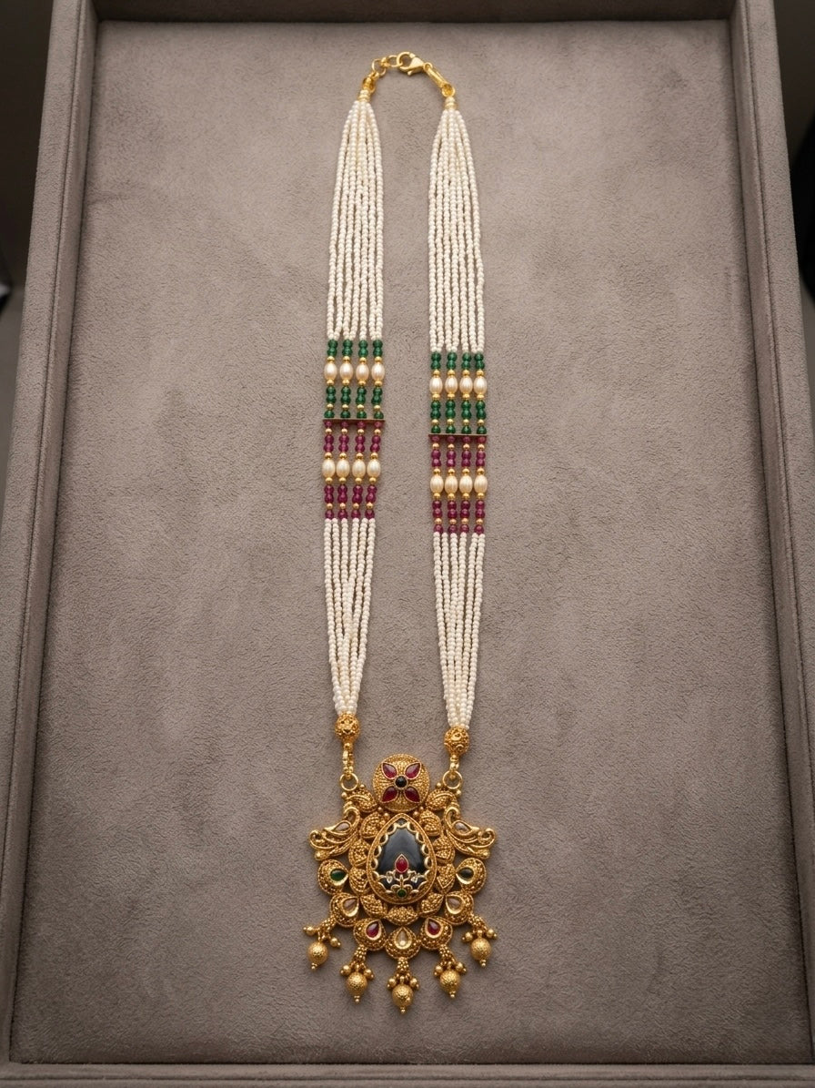 Elegant pearl necklace with antique pendant