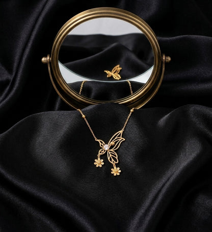 Elegant gold butterfly necklace with flowers