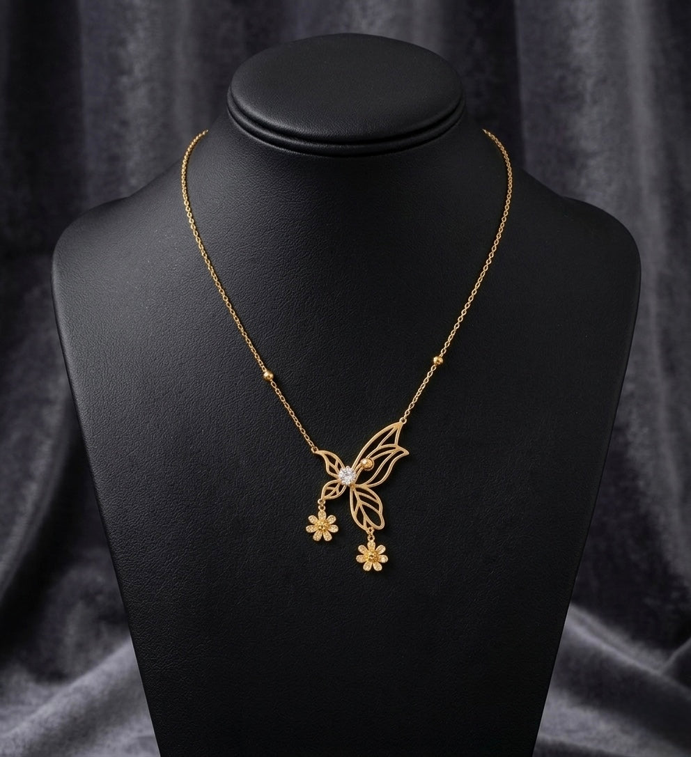 Elegant gold butterfly necklace with flowers