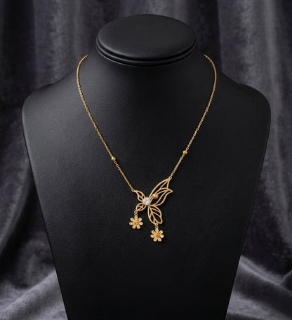 Elegant gold butterfly necklace with flowers