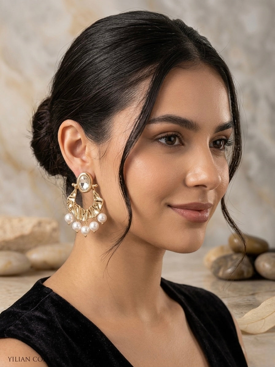 Vintage gold textured chandelier crystal earrings.