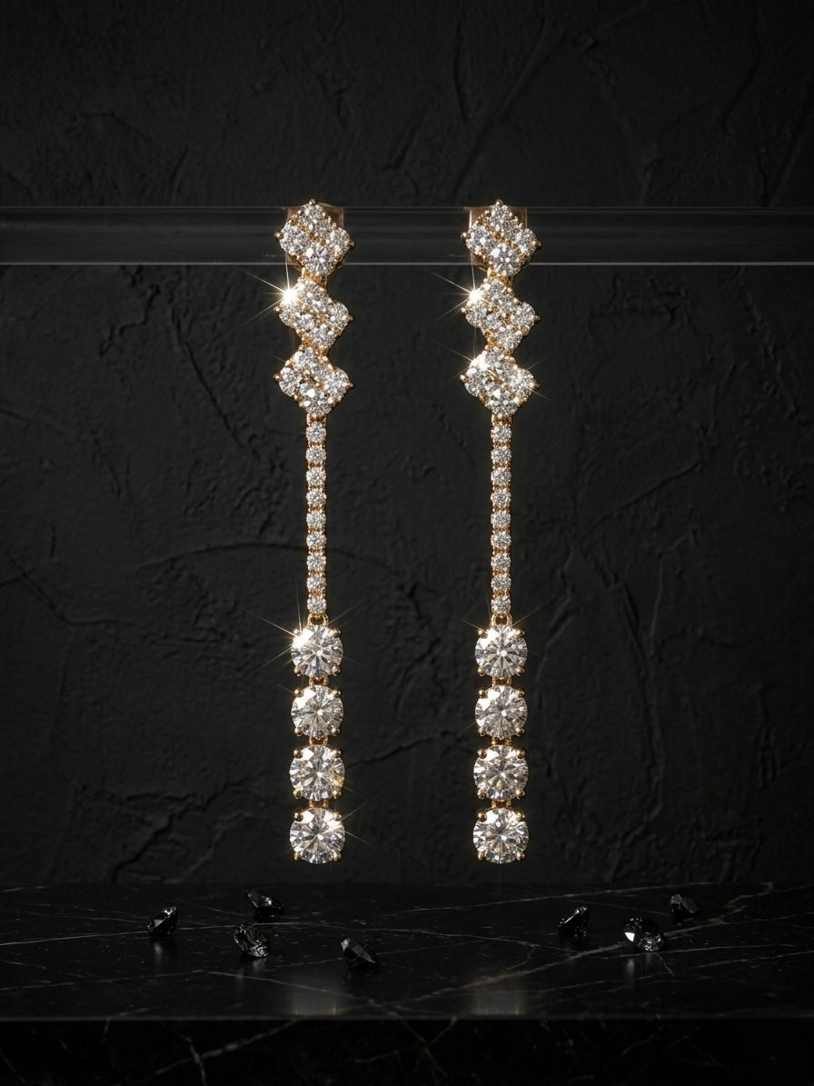 Luxurious gold geometric diamond drop earrings.