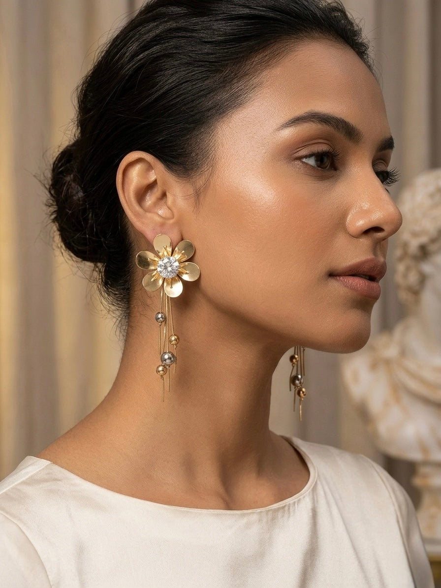 Elegant gold floral drop statement earrings.