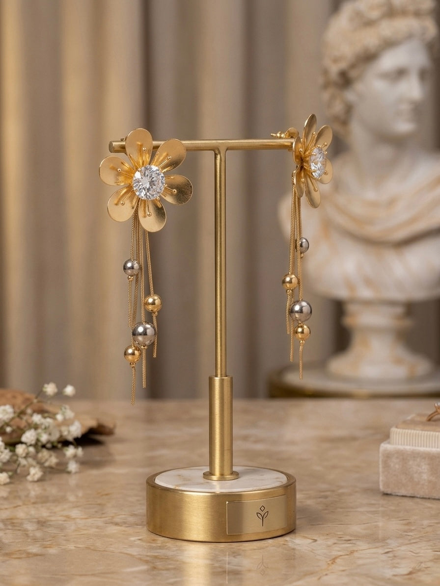 Elegant gold floral drop statement earrings.