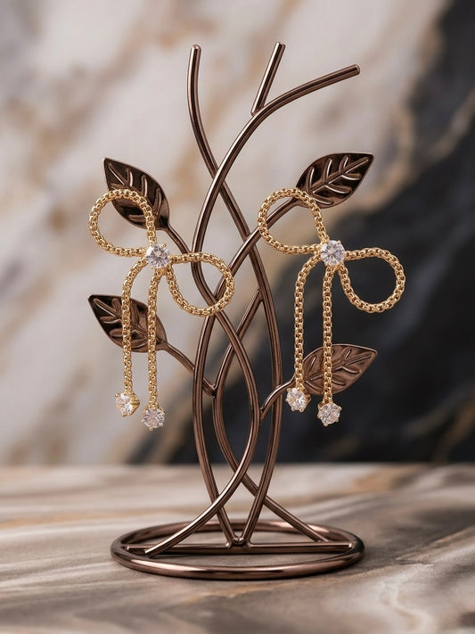 Charming gold bow drop crystal earrings.