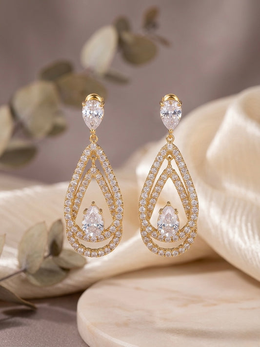 Luxury gold pear cut statement earrings.
