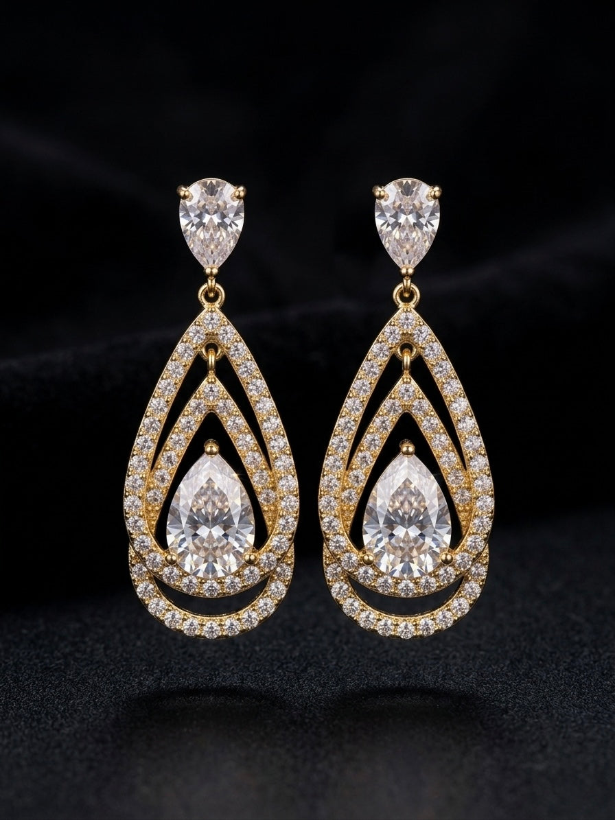 Luxury gold pear cut statement earrings.
