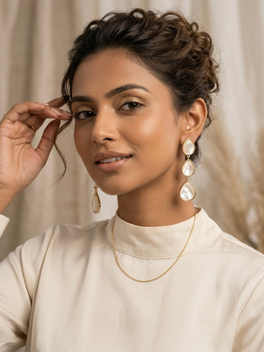 Elegant gold mother of pearl earrings.