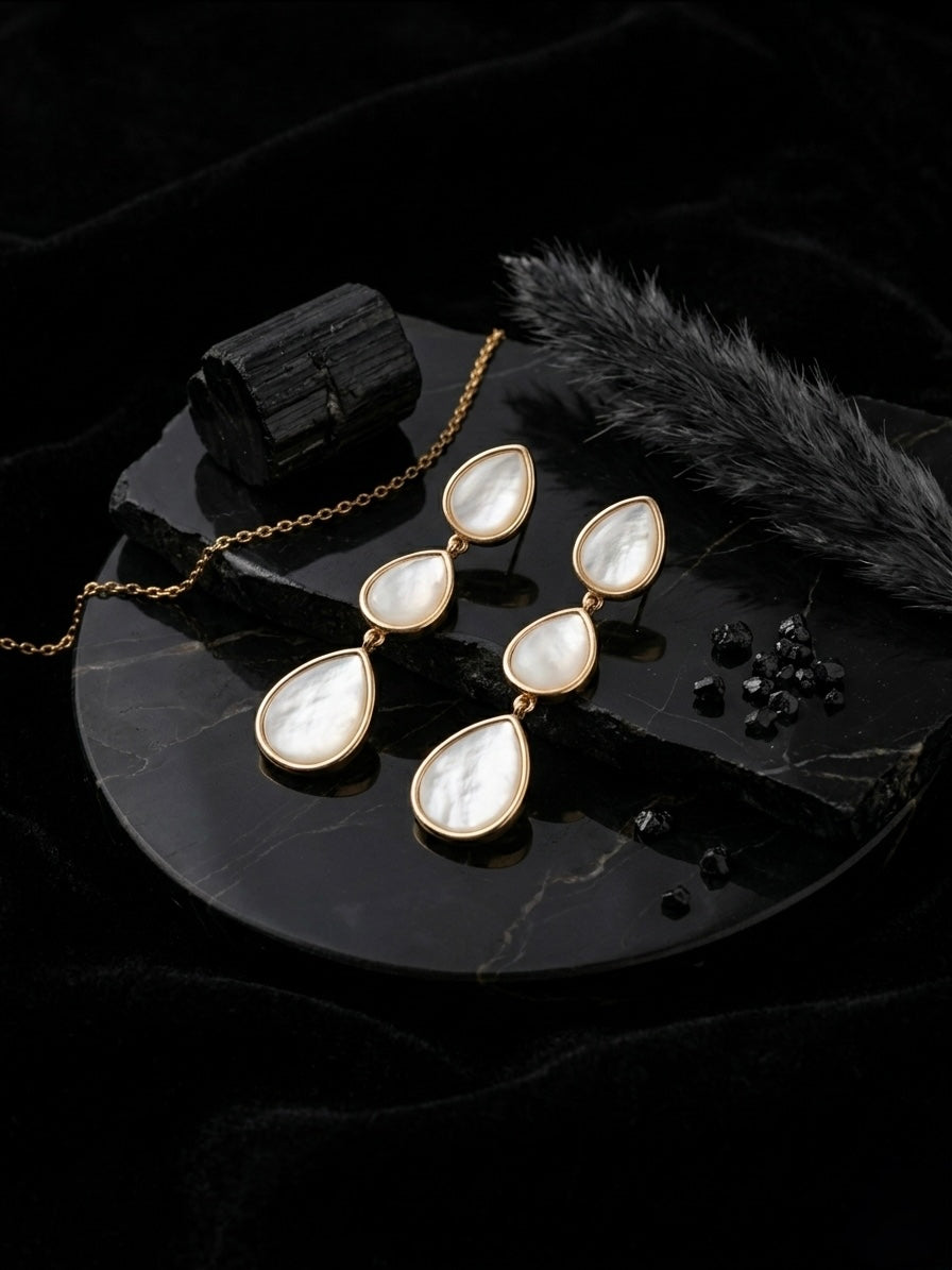 Elegant gold mother of pearl earrings.