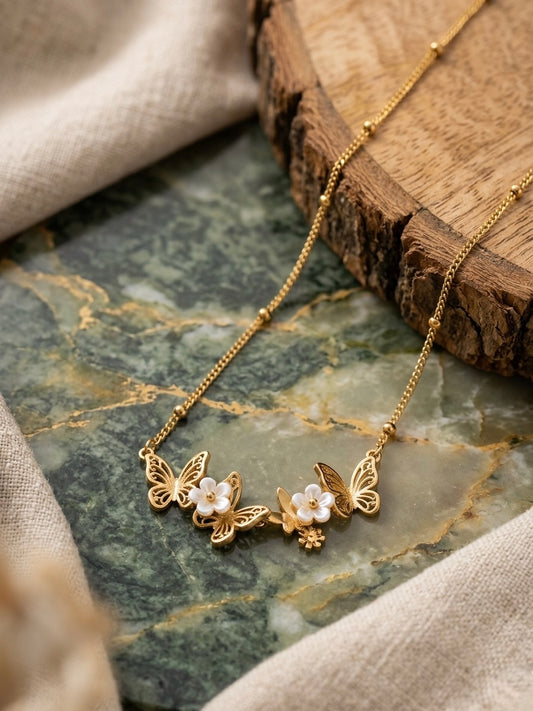 Charming gold butterfly flower satellite necklace.