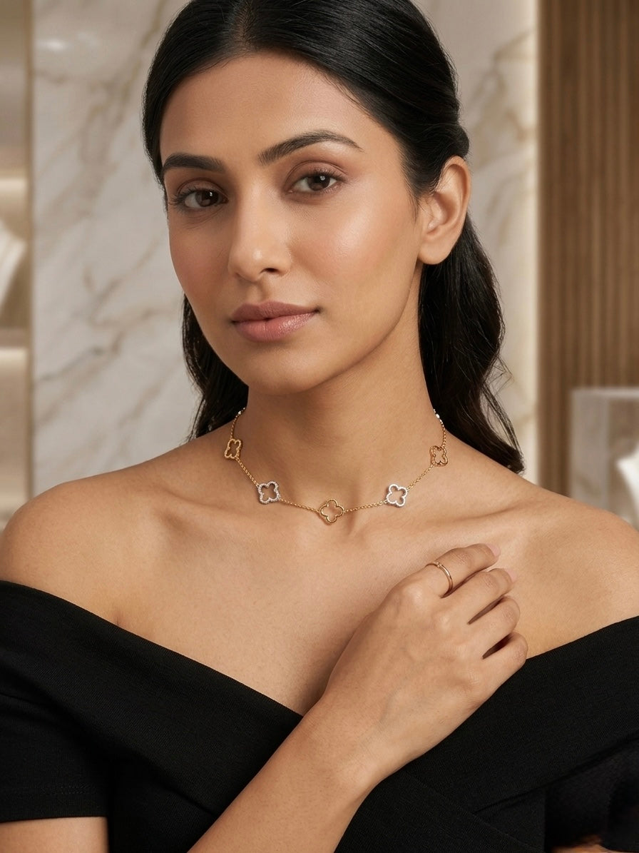 Chic gold and silver clover necklace.