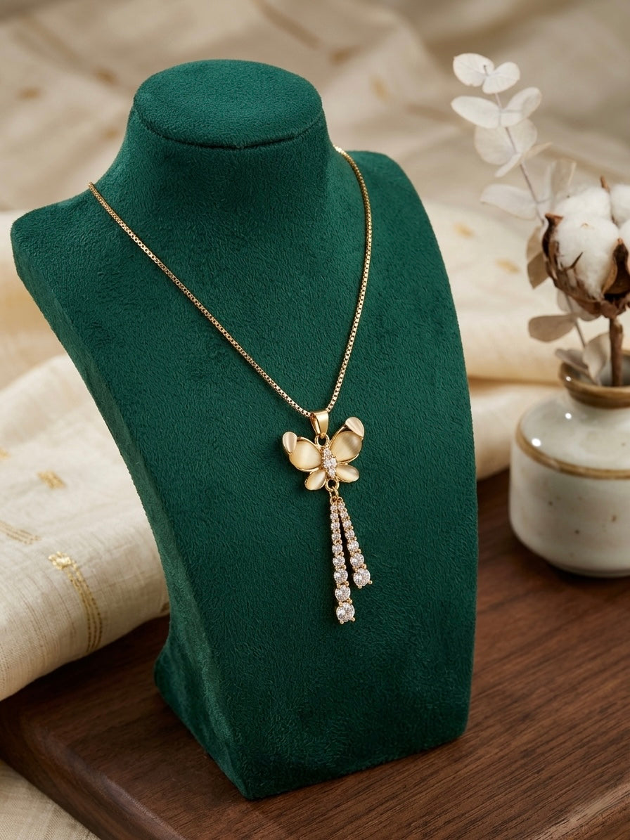 Graceful gold opal butterfly tassel necklace.