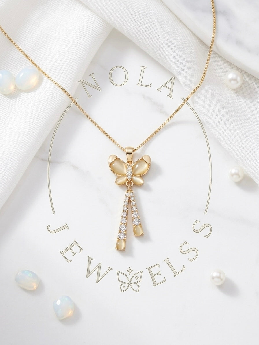 Graceful gold opal butterfly tassel necklace.